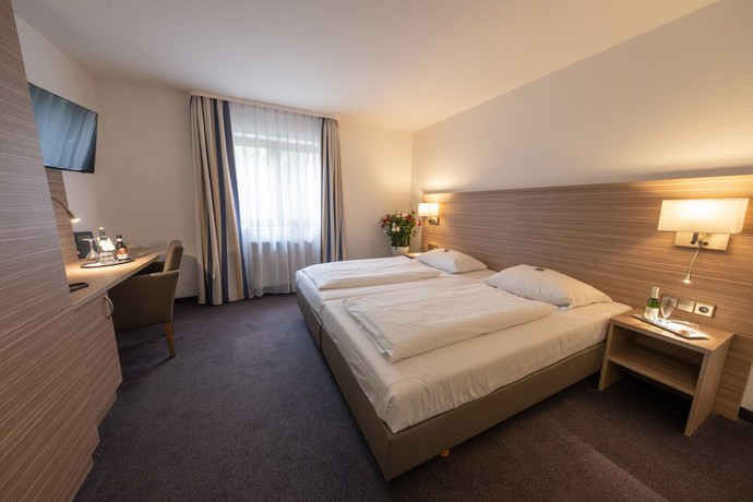 Imagen de la habitación del Hotel B&auml;r Sinsheim. Foto 6