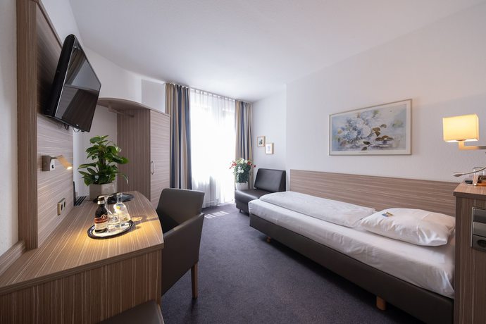 Imagen de la habitación del Hotel B&auml;r Sinsheim. Foto 10