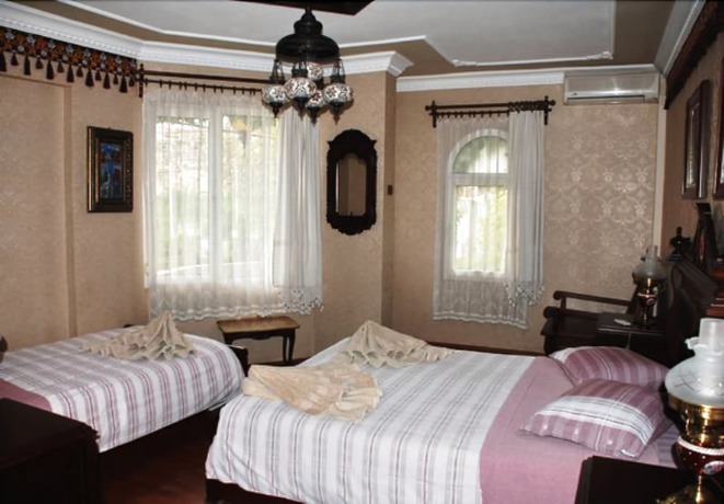 Imagen de la habitación del Hotel Bella. Foto 9