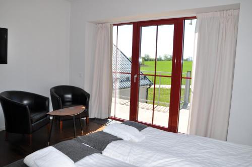 Imagen de la habitación del Hotel Bella Luna. Foto 6