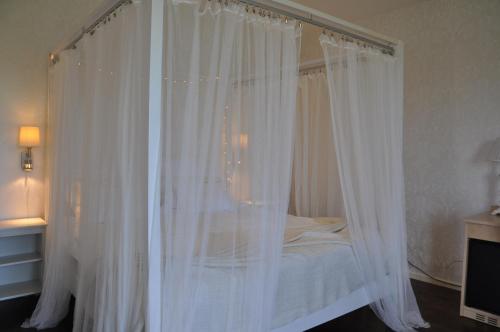 Imagen de la habitación del Hotel Bella Luna. Foto 9