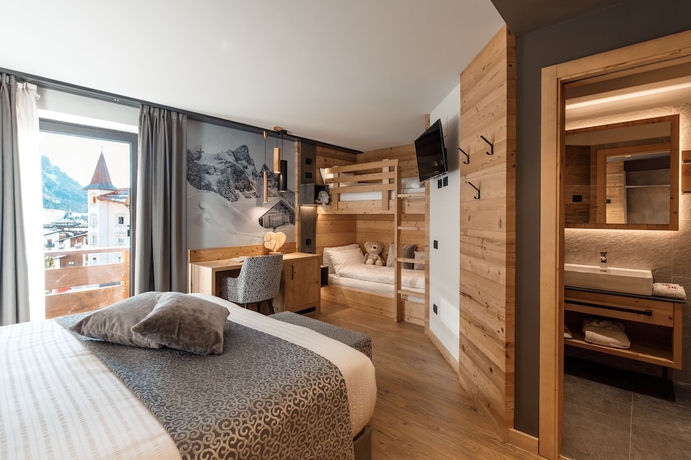 Imagen de la habitación del Hotel Belvedere, San Martino di Castrozza. Foto 2