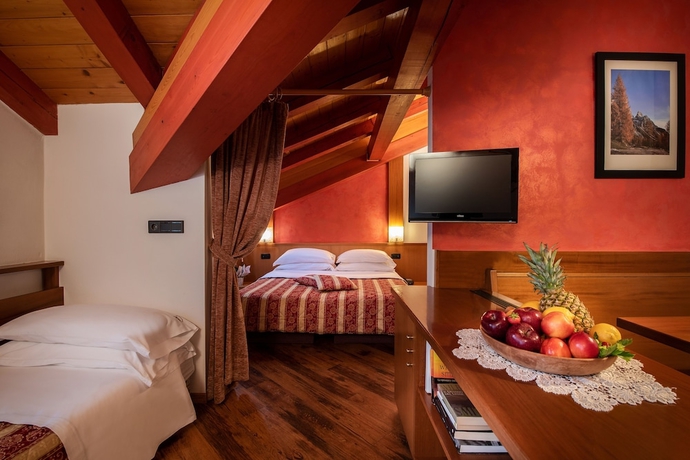 Imagen de la habitación del Hotel Belvedere, San Martino di Castrozza. Foto 6