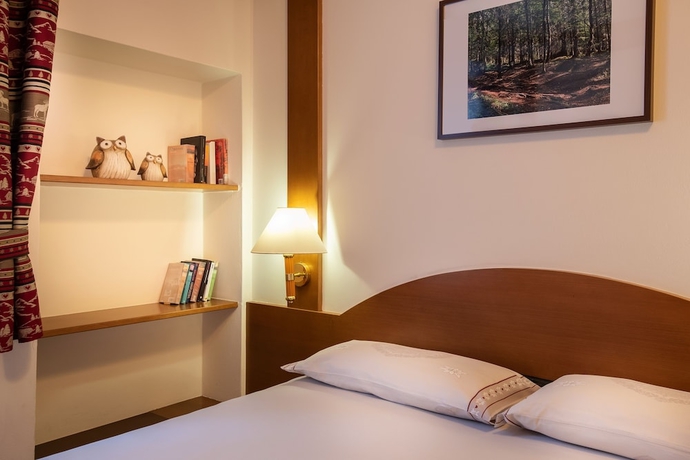 Imagen de la habitación del Hotel Belvedere, San Martino di Castrozza. Foto 9