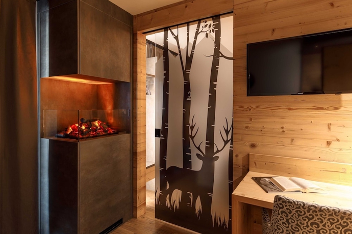 Imagen de la habitación del Hotel Belvedere, San Martino di Castrozza. Foto 11