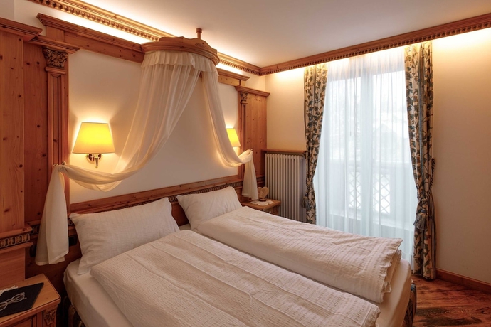 Imagen de la habitación del Hotel Belvedere, San Martino di Castrozza. Foto 17