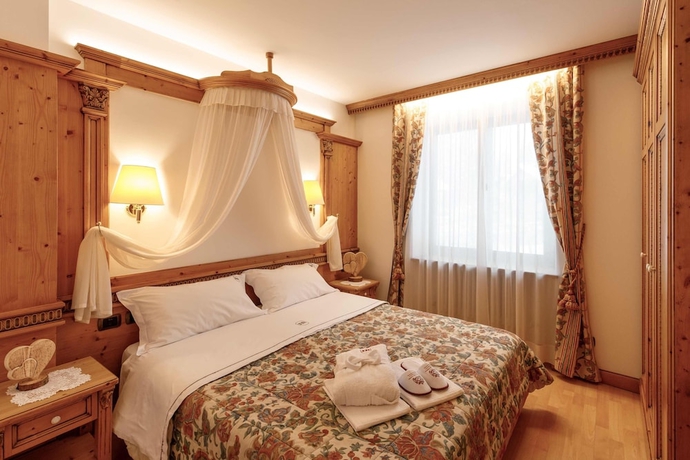 Imagen de la habitación del Hotel Belvedere, San Martino di Castrozza. Foto 18