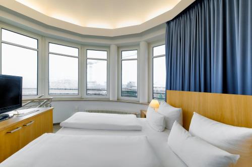 Imagen de la habitación del Hotel Berlin Mitte by Coffee Fellows. Foto 17