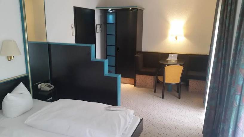 Imagen de la habitación del Hotel Bitterfelder Hof. Foto 3