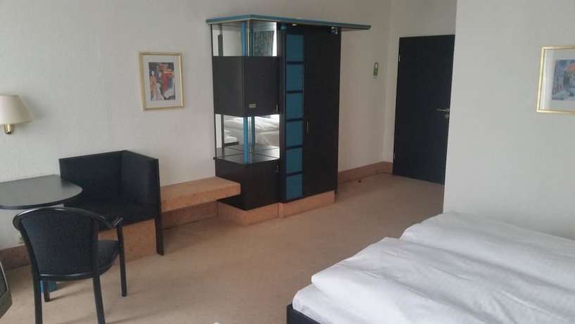 Imagen de la habitación del Hotel Bitterfelder Hof. Foto 12