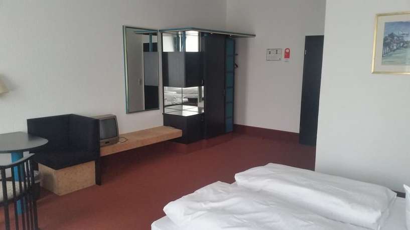 Imagen de la habitación del Hotel Bitterfelder Hof. Foto 13