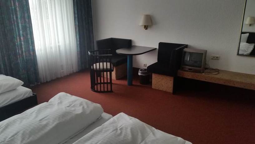 Imagen de la habitación del Hotel Bitterfelder Hof. Foto 14