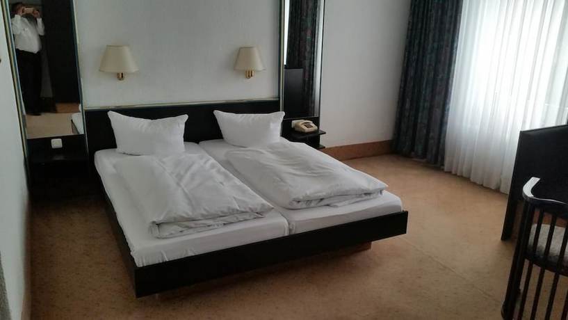 Imagen de la habitación del Hotel Bitterfelder Hof. Foto 16