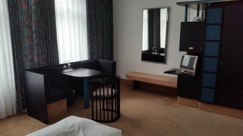 Imagen de la habitación del Hotel Bitterfelder Hof. Foto 19