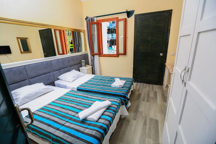Imagen de la habitación del Hotel Bleu Nuit Bodrum. Foto 7