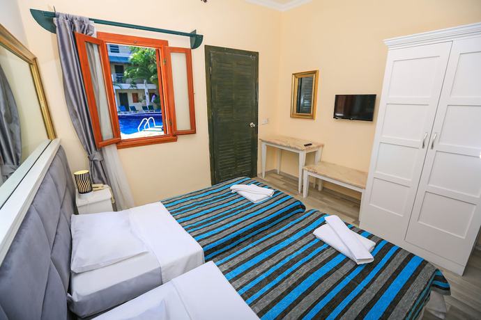 Imagen de la habitación del Hotel Bleu Nuit Bodrum. Foto 17