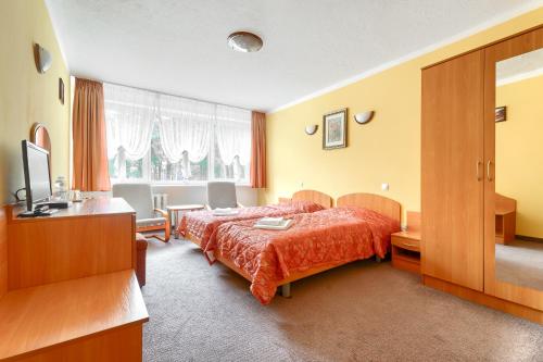 Imagen de la habitación del Hotel Bocianie Gniazdo. Foto 19