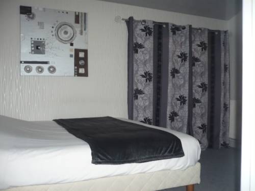 Imagen de la habitación del Hotel Bon Accueil. Foto 15
