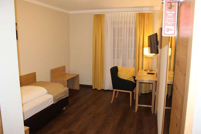 Imagen de la habitación del Hotel Brauereigasthof Amberger. Foto 16