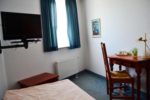 Imagen de la habitación del Hotel Brauhaus Weyhausen. Foto 7