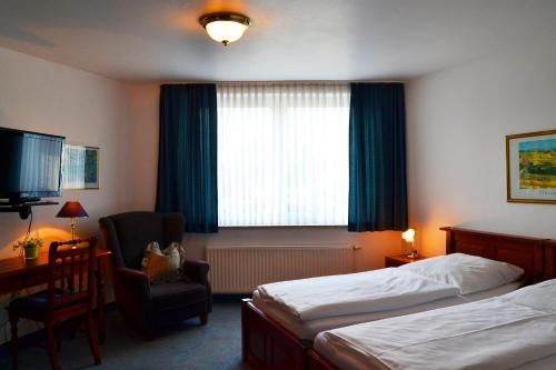 Imagen de la habitación del Hotel Brauhaus Weyhausen. Foto 8