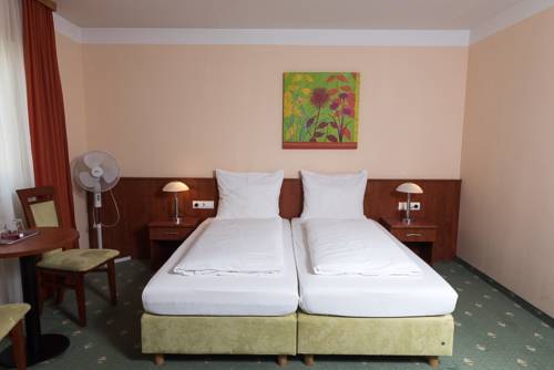 Imagen de la habitación del Hotel Breitenlee. Foto 14