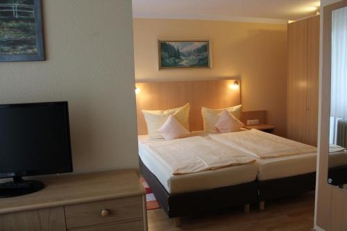 Imagen de la habitación del Hotel Brigitte. Foto 8