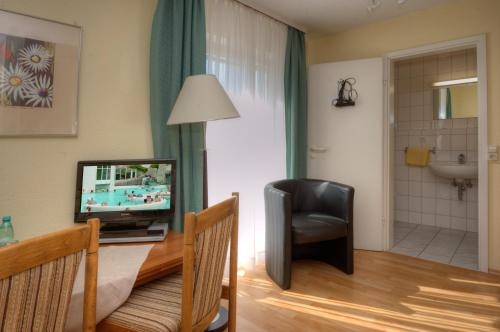 Imagen de la habitación del Hotel Brigitte. Foto 9