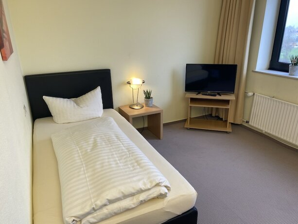 Imagen de la habitación del Hotel Br&uuml;ckentor. Foto 16