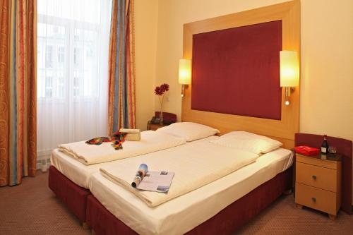 Imagen de la habitación del Hotel Buchenpark. Foto 8