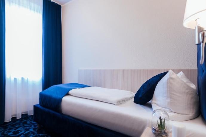 Imagen de la habitación del Hotel CULT Hamburg. Foto 7