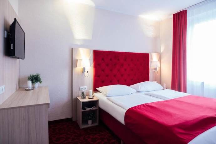 Imagen de la habitación del Hotel CULT Hamburg. Foto 13