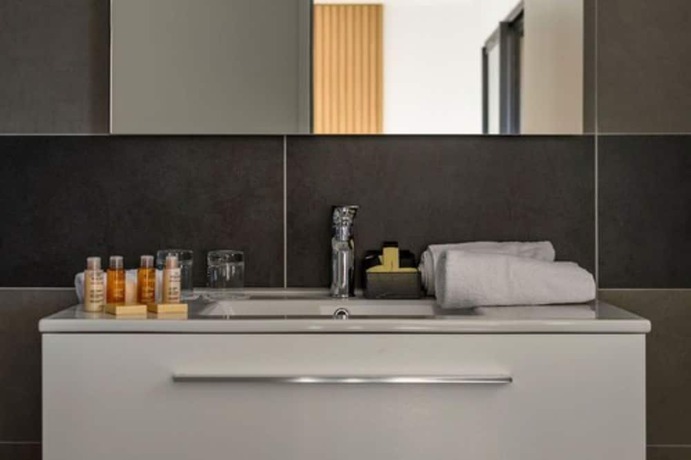 Imagen de la habitación del Hotel Calarossa Bay Resort. Foto 6