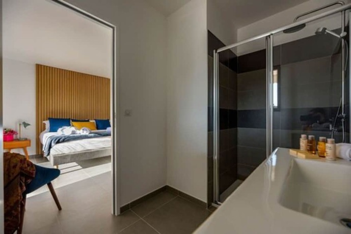 Imagen de la habitación del Hotel Calarossa Bay Resort. Foto 13