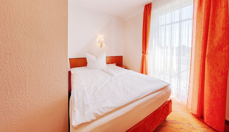 Imagen de la habitación del Hotel Carmina am See. Foto 17