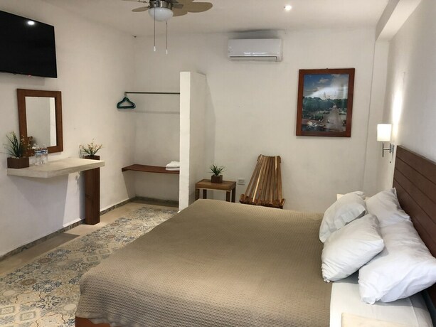 Imagen de la habitación del Hotel Casa Bamboo. Foto 9