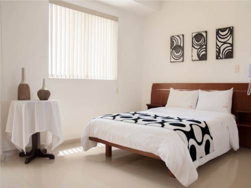 Imagen de la habitación del Hotel Catama Inn. Foto 6