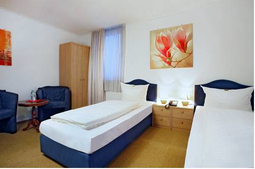 Imagen de la habitación del Hotel Celina. Foto 11