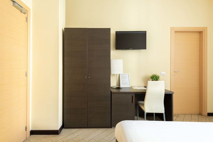 Imagen de la habitación del Hotel Central Lodge. Foto 9