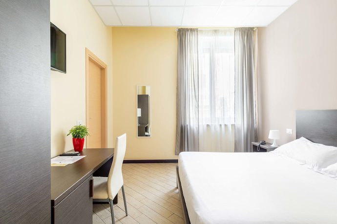 Imagen de la habitación del Hotel Central Lodge. Foto 11