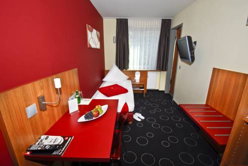 Imagen de la habitación del Hotel Central, Nuremberg. Foto 8