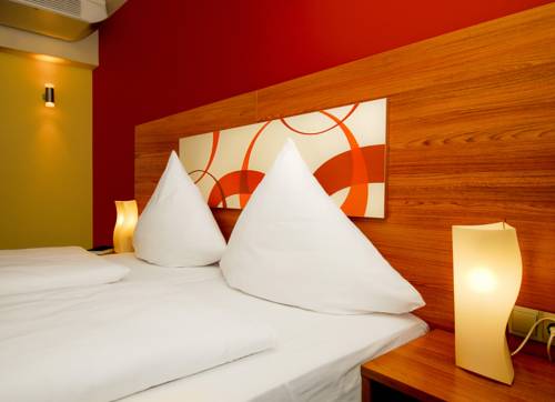 Imagen de la habitación del Hotel Central, Nuremberg. Foto 10