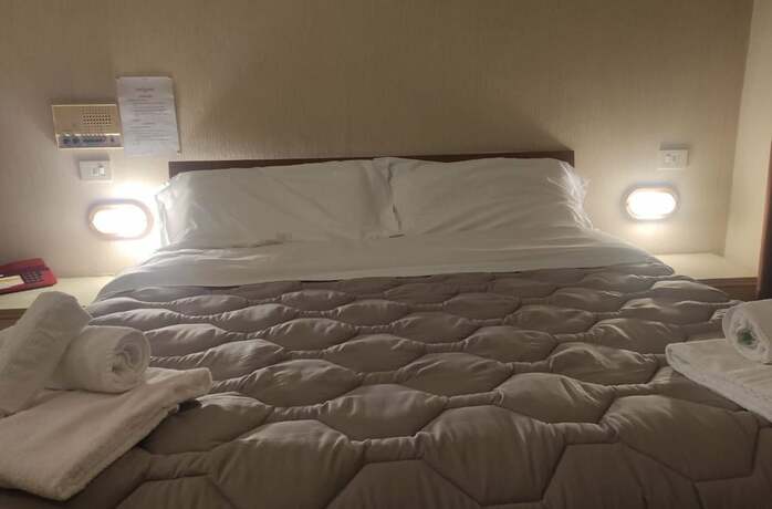 Imagen de la habitación del Hotel Centrale, Chiusi. Foto 10