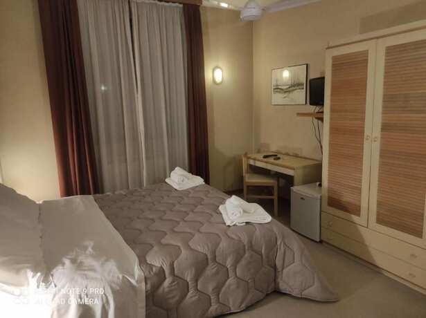 Imagen de la habitación del Hotel Centrale, Chiusi. Foto 11