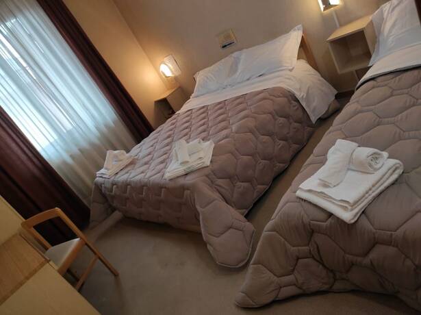 Imagen de la habitación del Hotel Centrale, Chiusi. Foto 17