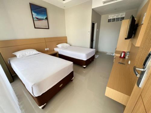 Imagen de la habitación del Hotel Century Pangandaran. Foto 19