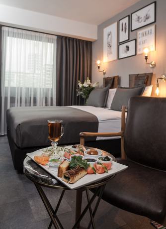 Imagen de la habitación del Hotel Cinnah. Foto 3