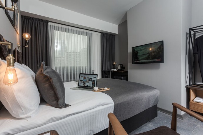 Imagen de la habitación del Hotel Cinnah. Foto 4