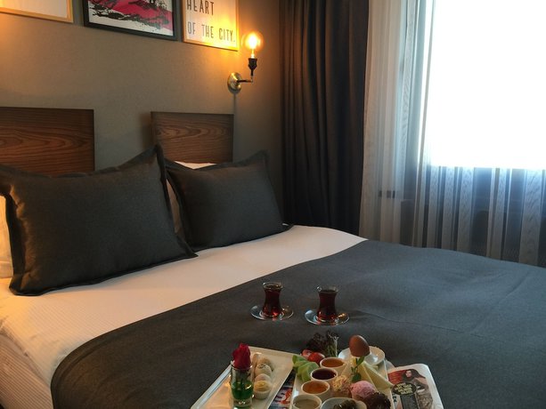 Imagen de la habitación del Hotel Cinnah. Foto 5