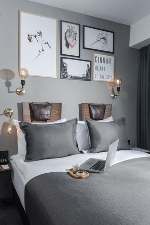 Imagen de la habitación del Hotel Cinnah. Foto 6